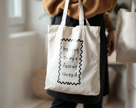 Hanging On By A Fucking Thread | Natural & Black | Organic Cotton Tote Bag