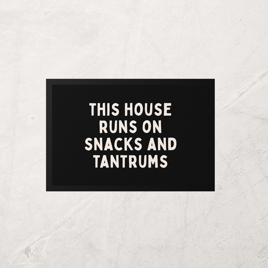 Black sign with white text on a textured white background