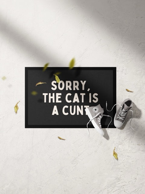 Sorry, The Cat Is A Cunt | Cream and Charcoal | Indoor Door Mat