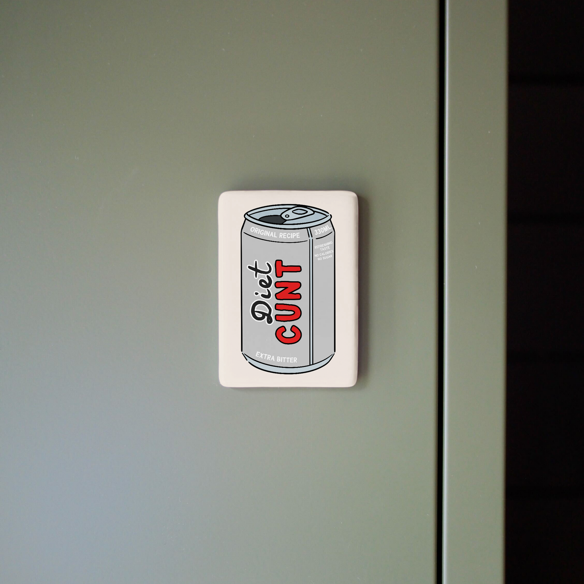 Sticker with a can design and text on a light green surface