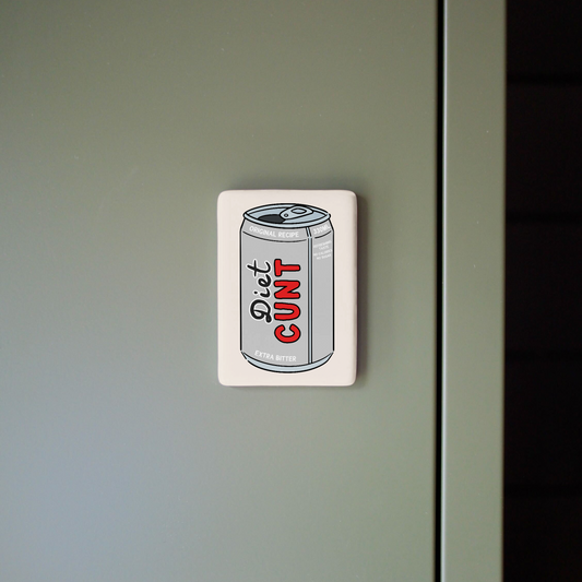 Sticker with a can design and text on a light green surface