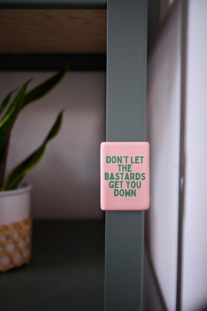 Don't Let The Bastards Get You Down | Ceramic Magnet