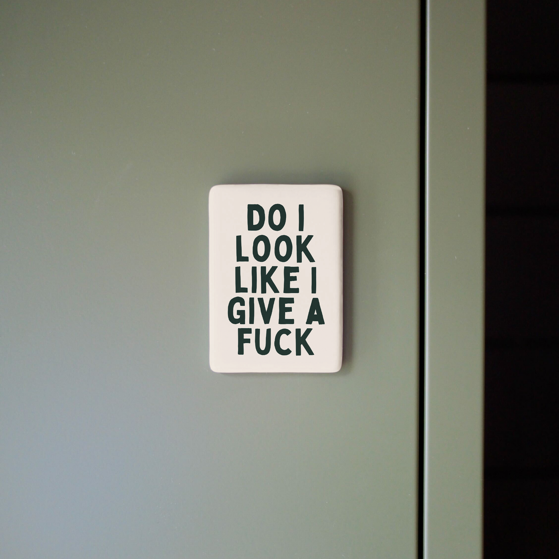 Sticker with text on a green door