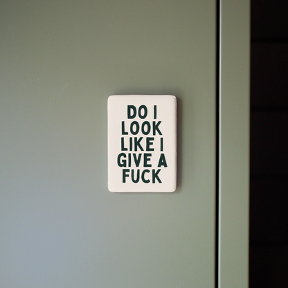 Sticker with text on a green door