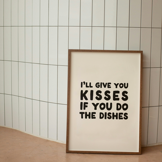 Framed print with humorous text on a tiled wall