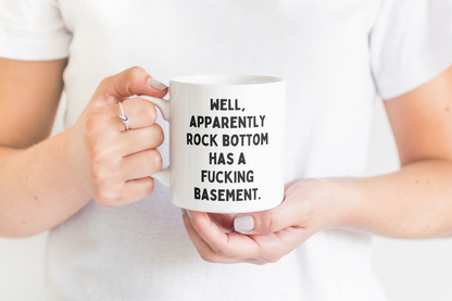 Well, Apparently Rock Bottom Has A Fucking Basement | Black | Ceramic Mug