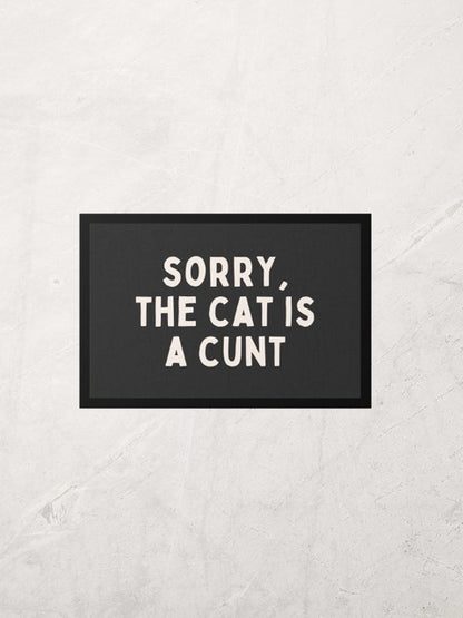 Sorry, The Cat Is A Cunt | Cream and Charcoal | Indoor Door Mat