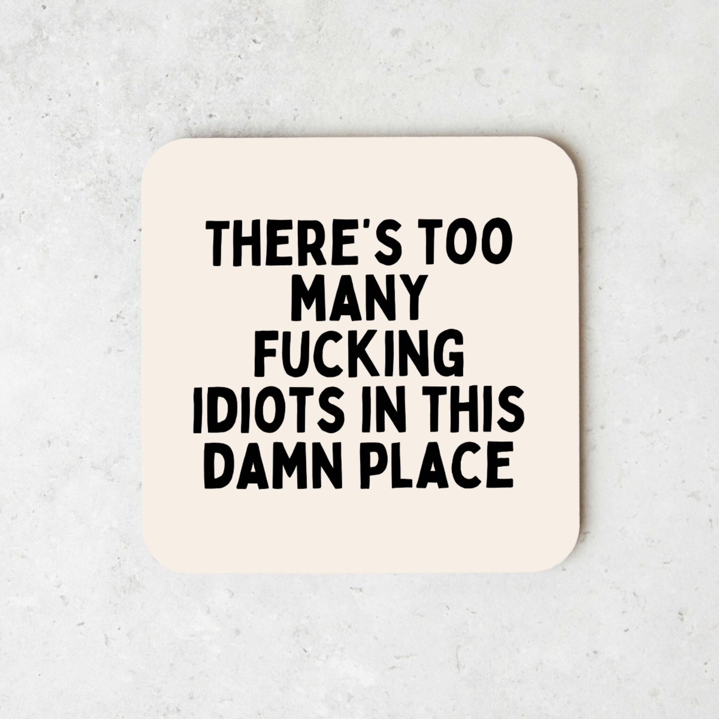 There's Too Many Fucking Idiots In This Damn Place | Black and Cream | Coaster