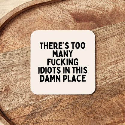 There's Too Many Fucking Idiots In This Damn Place | Black and Cream | Coaster