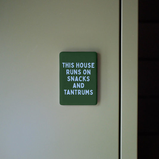 This House Runs On Snacks And Tantrums | Ceramic Magnet