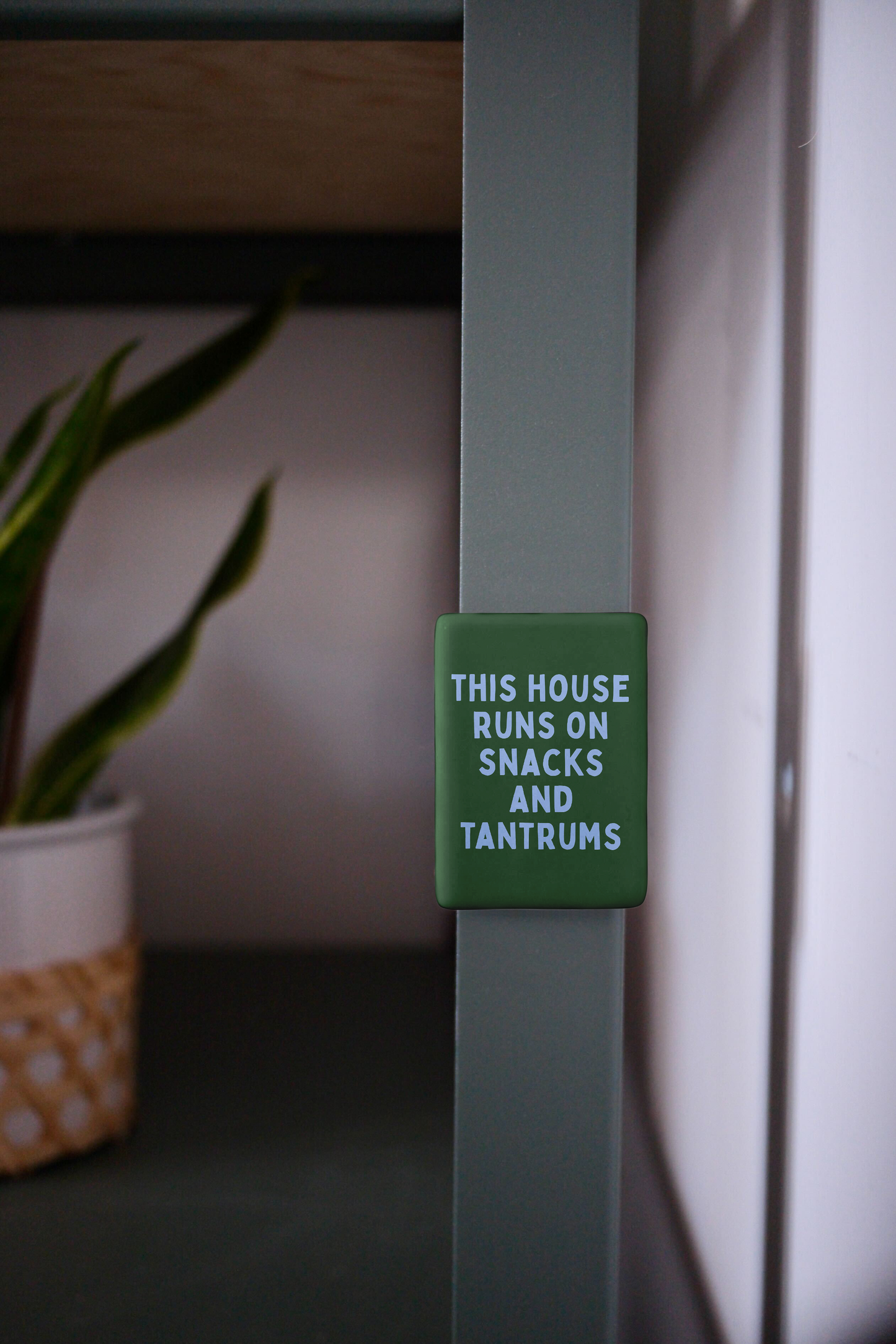 This House Runs On Snacks And Tantrums | Ceramic Magnet