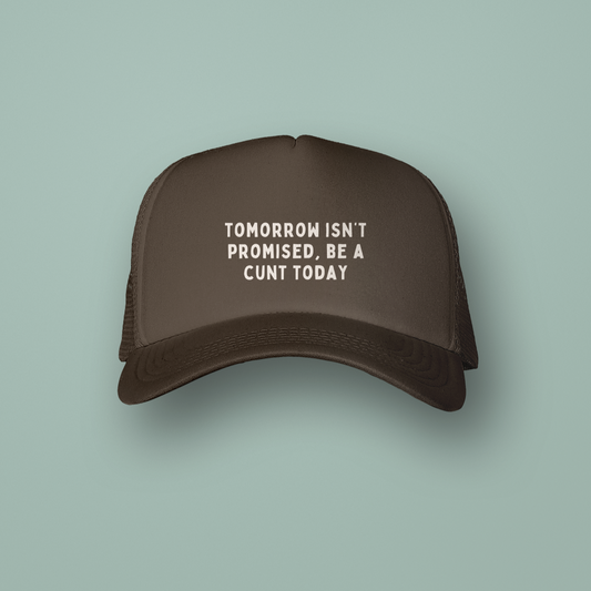 Brown cap with white text on a light green background