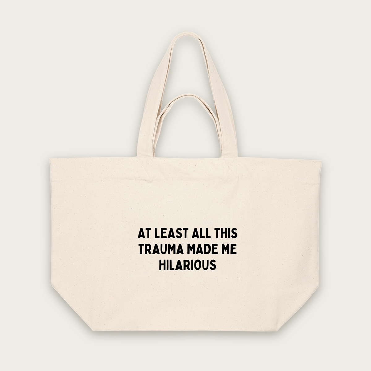 At Least All This Trauma Made Me Hilarious | Tote Bag in Natural Raw (18450_At-Least-All-This_STAU117_Natural-Raw_Tote-Bag_Mockup.png)