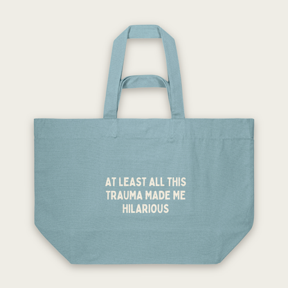 At Least All This Trauma Made Me Hilarious | Tote Bag in Pebble Blue (18451_At-Least-All-This_STAU117_Pebble-Blue_Tote-Bag_Mockup.png)