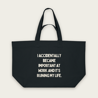 I Accidentally Became Important | Tote Bag in Black (18551_I-Accidentally-Became-Important-At-Work_STAU117_Black_Tote-Bag_Mockup.png)