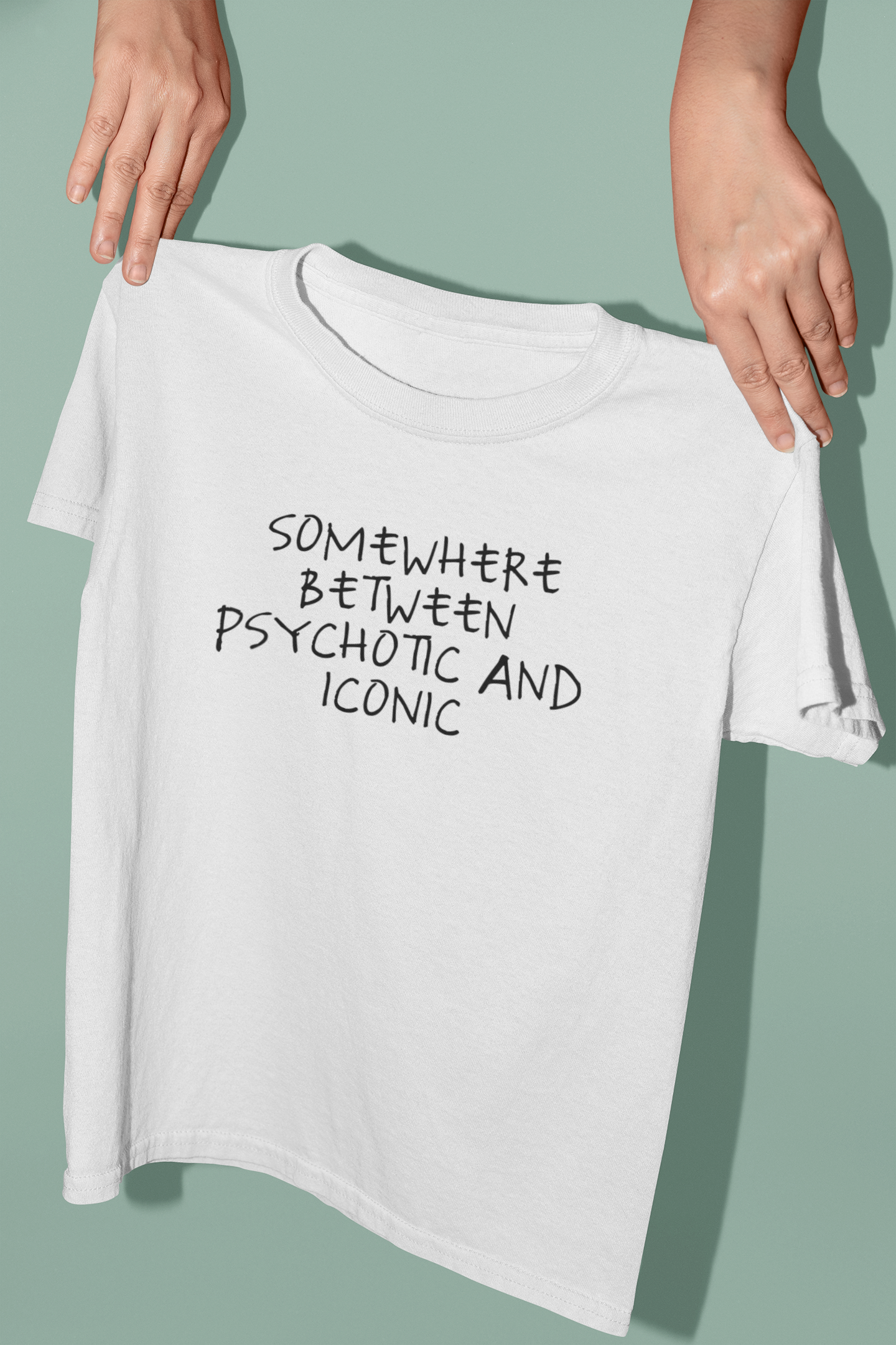 Somewhere Between Psychotic And Iconic | Black Graphic | Organic Unisex T Shirt