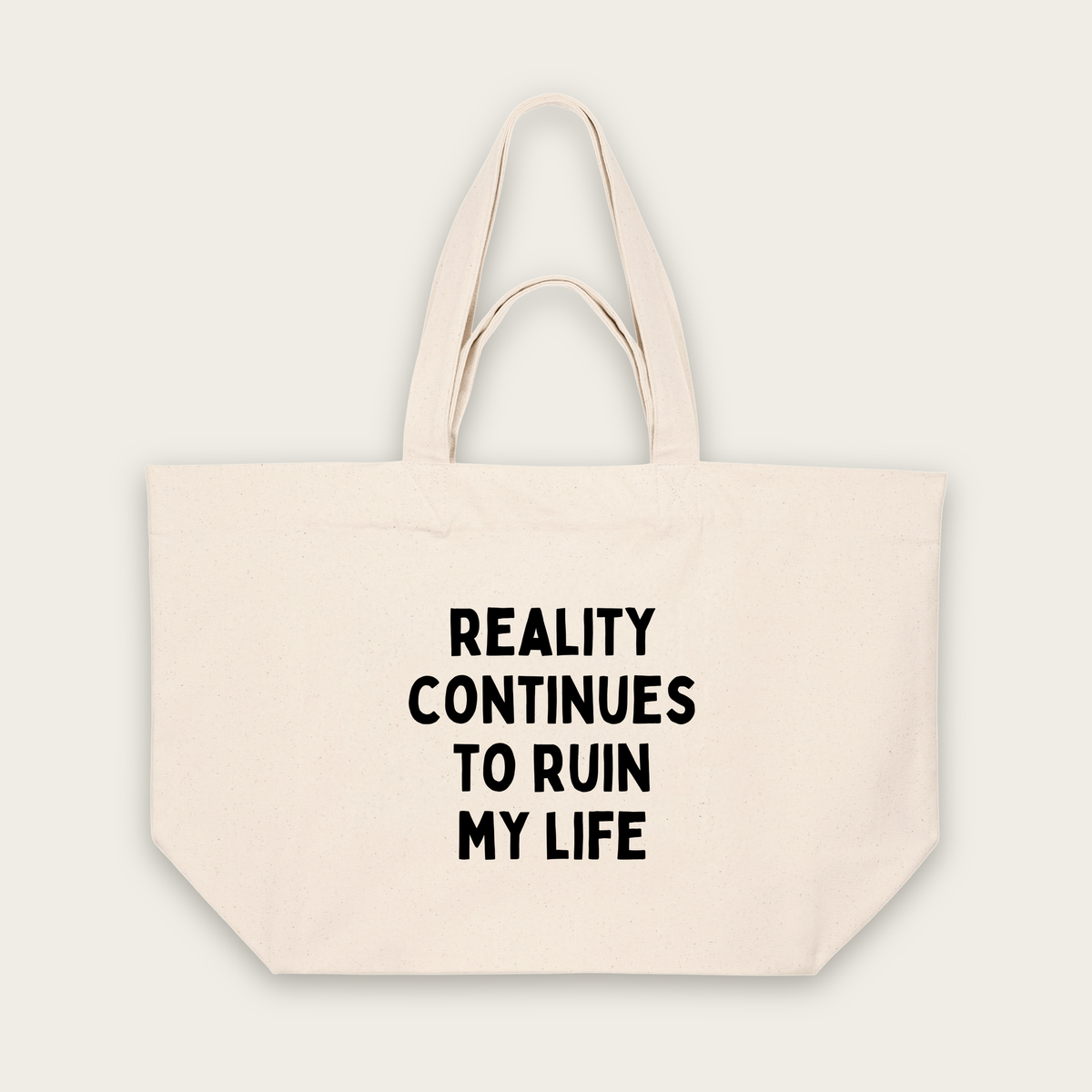 Reality Continues To Ruin My Life | Tote Bag in Natural Raw (18802_Reality-Continues-To-Ruin-My-Life_STAU117_Natural-Raw_Tote-Bag_Mockup.png)
