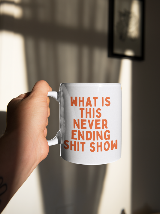 What Is This Never Ending Shit Show | Orange | Ceramic Mug