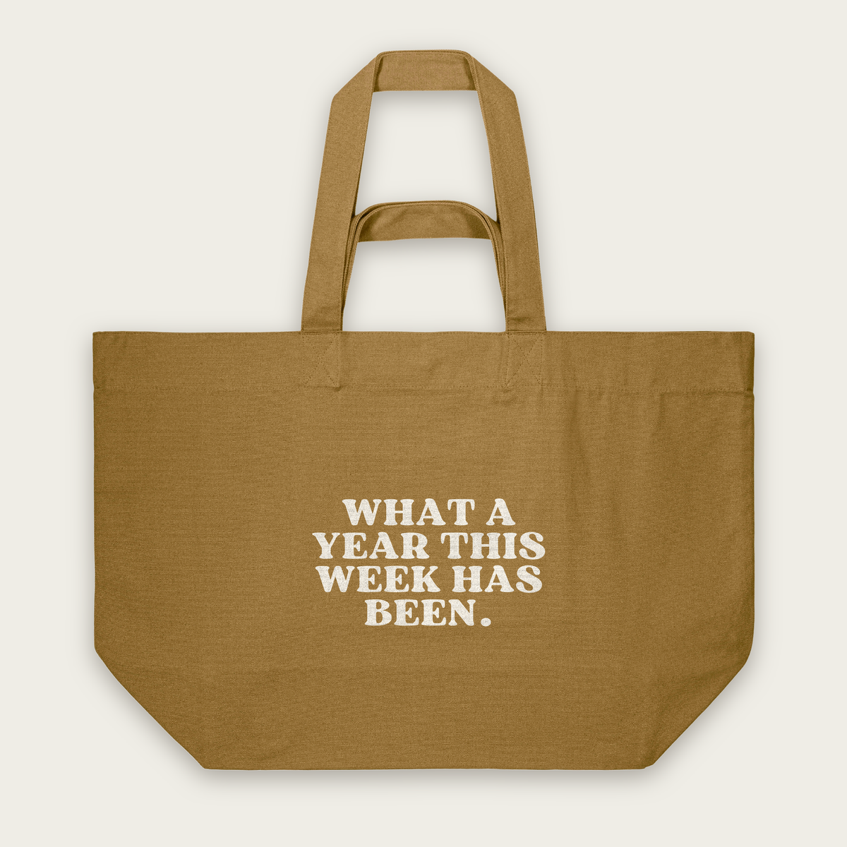 What A Year This Week Has Been | Tote Bag in Bronze (18877_What-A-Year-This-Week-Has-Been_STAU117_Bronze_Tote-Bag_Mockup.png)